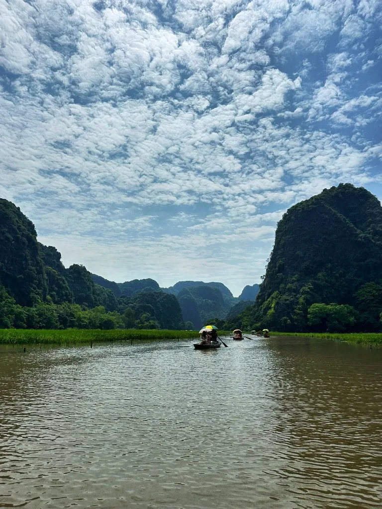 a-journey-through-vietnam-by-rail-and-land-ninh-binh-tam-coc-river.webp
